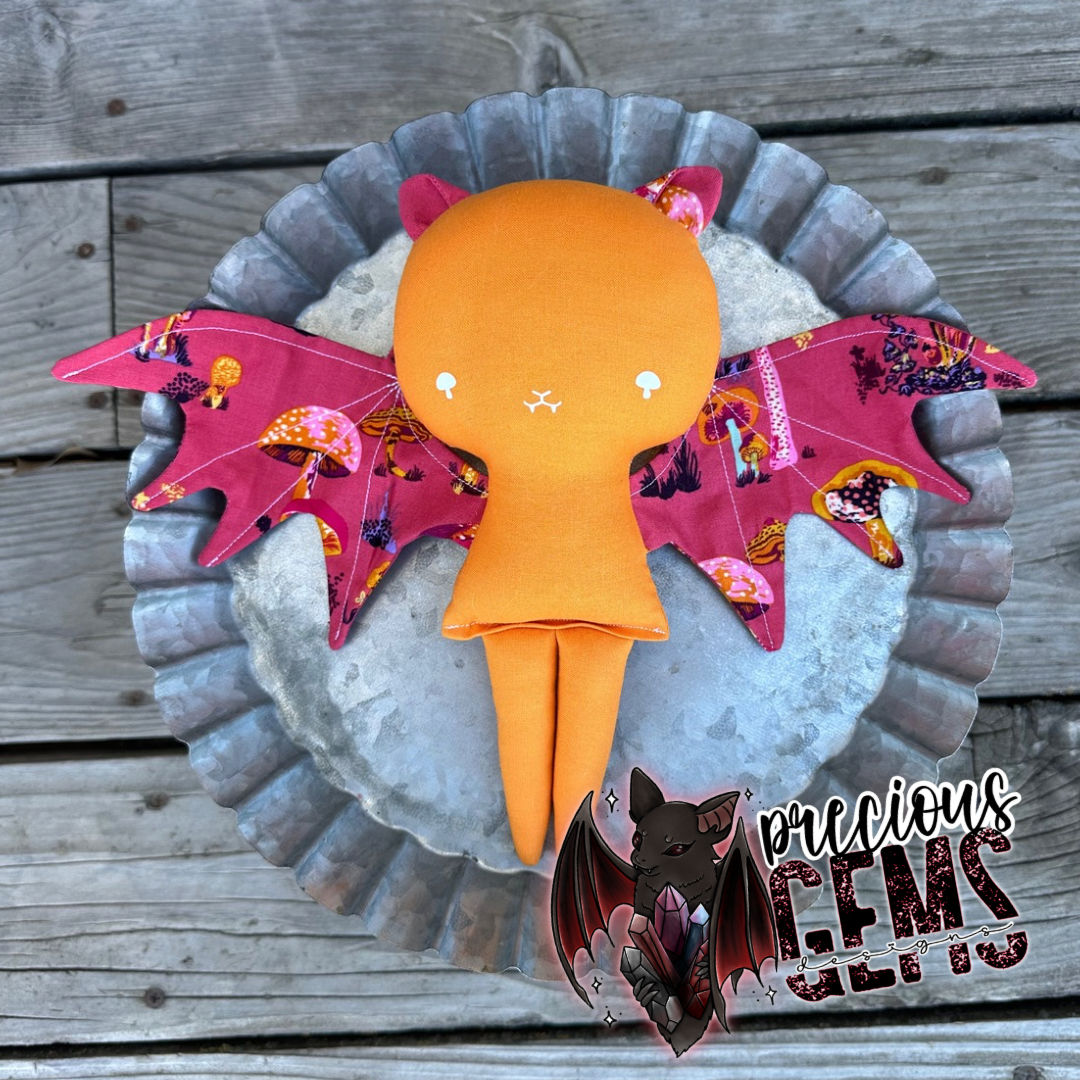 Golden mushy bat doll RTS